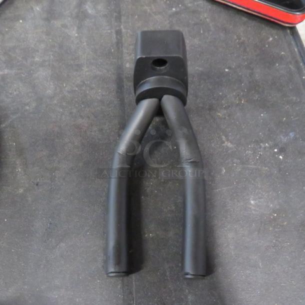 New guitar hanger, black, model #B005CX4GLE, rubber-coated hooks, wall-mount design, pristine condition.