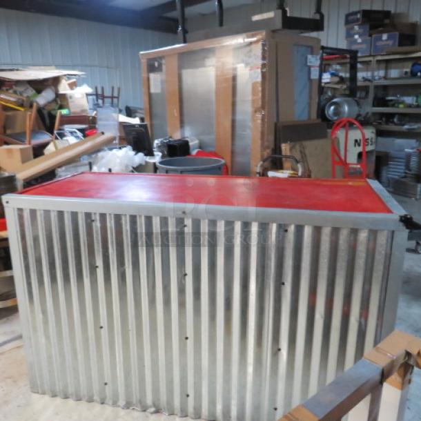 Wooden metal hostess stand with red top, 67x28x41 inches, features three under shelves. Appears in good condition.