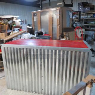 Wooden metal hostess stand with red top, 67x28x41 inches, features three under shelves. Appears in good condition.