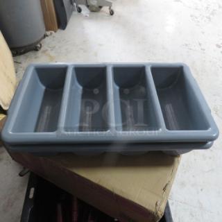 Gray plastic flatware holder with four compartments. New condition. Ideal for organizing utensils. Model 2XBID.