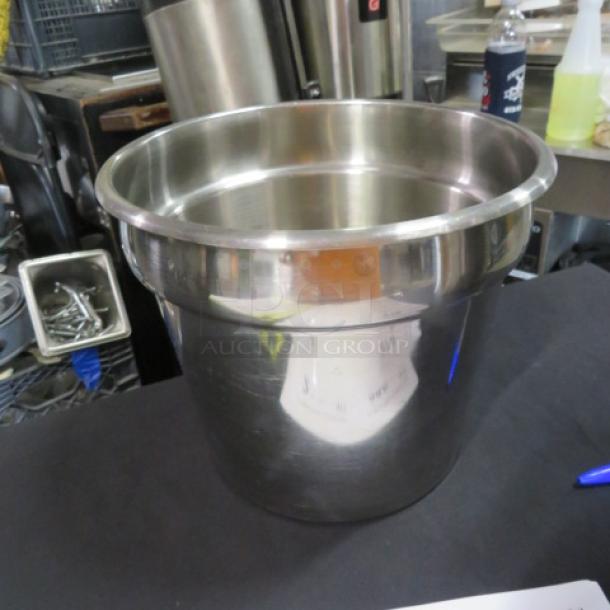 Stainless steel bain marie pot, 9.5x8 inches, gleaming finish, excellent condition, ideal for food warming or serving.