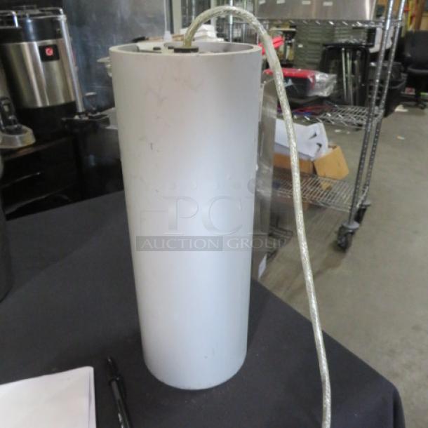4.5X12 white pendant light fixture, cylindrical shape, includes attached cord, gently used condition.