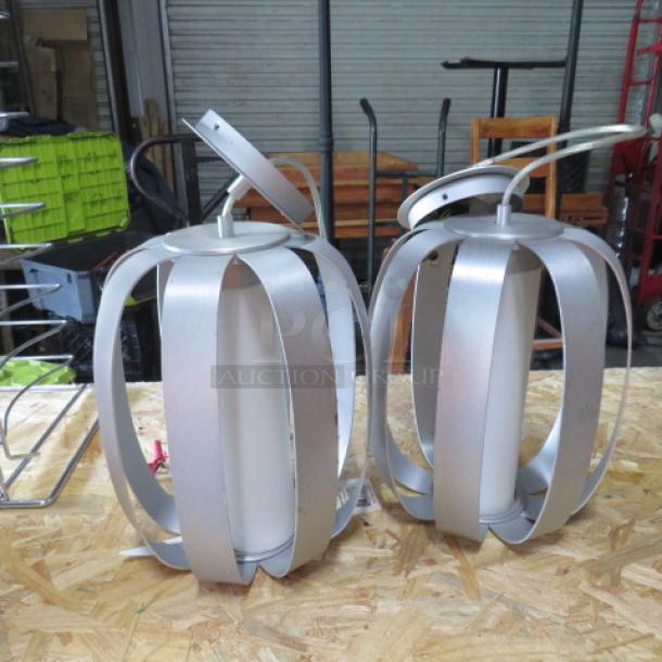 Contemporary pendant lights, metal frame with modern design, set of two, silver finish, excellent condition.