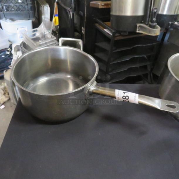 Winco 9X5 stainless steel sauce pan, sturdy handle, good condition, auction tag labeled "281," ideal for kitchen use.