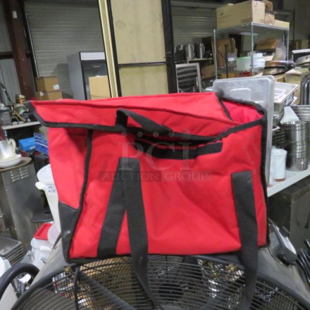 Redi Heat heated pizza bag, red with black handles, used condition. Features durable material for heat retention.