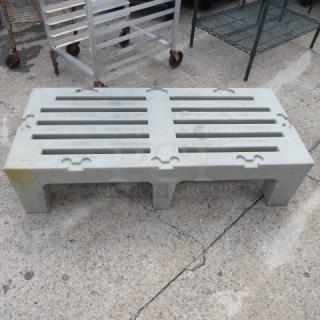 Cambro Poly Dunnage Rack, Model D480, with 3,000lb capacity. Durable, used condition. Pale gray color.