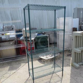 Green Metro shelf unit with four wire shelves on casters, measuring 36x18x80.5 inches. Sturdy and versatile.