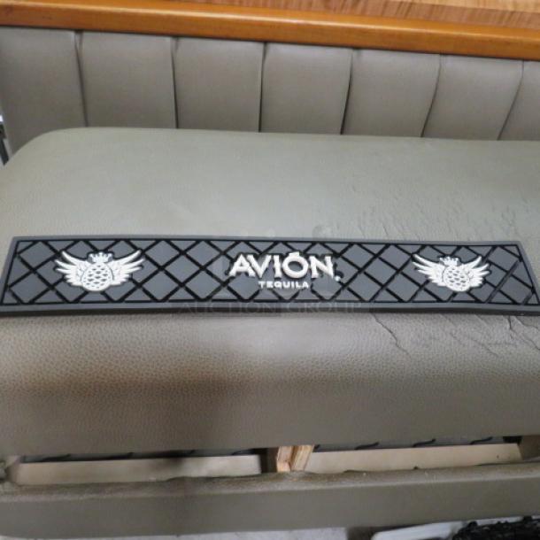 Avion Tequila bar mat with logo, black rubber, diamond pattern, used condition.