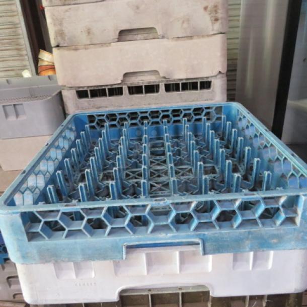 Blue dishwasher rack with grid design, model 2XBID. Used condition with visible dirt, ideal for commercial use.