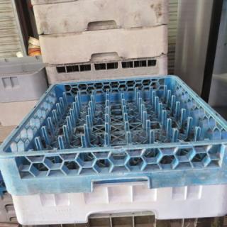 Blue dishwasher rack with grid design, model 2XBID. Used condition with visible dirt, ideal for commercial use.