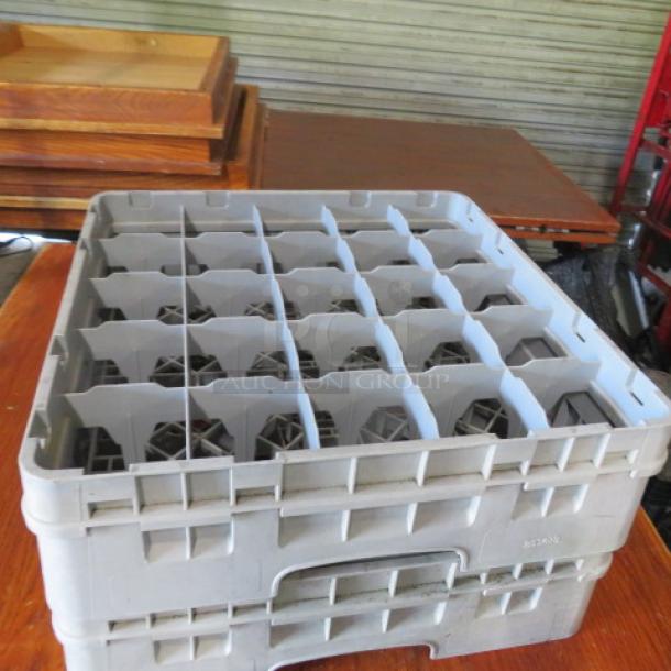 Gray 25-hole dishwasher rack, model 2XBID, in good condition, sturdy plastic, suitable for commercial use.