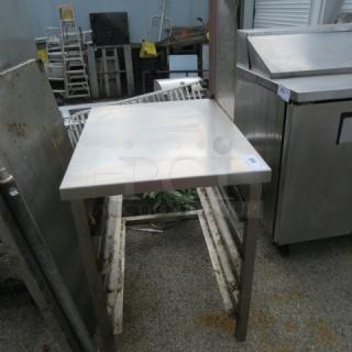 Stainless steel speed rack with SS top, 24x32x31 inches, right side splash, used condition. Suitable for commercial kitchens.
