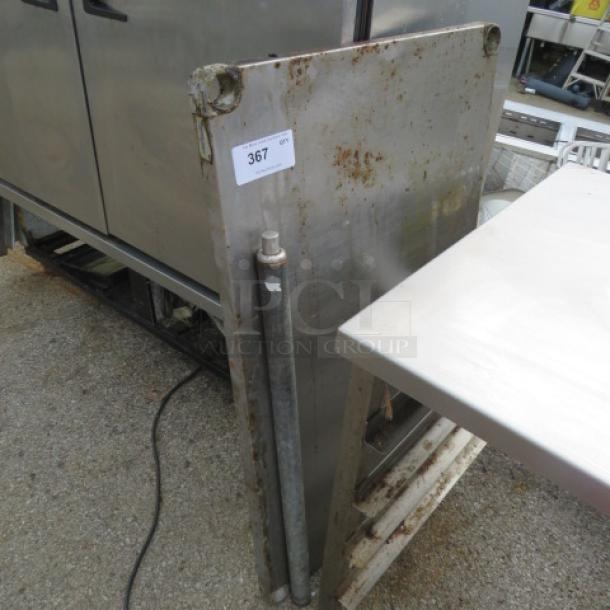 Advance Tabco bottom shelf with one leg, 42x24 inches, shows signs of rust and wear, labeled "367."