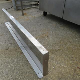 Stainless steel wall mount shelf with one bracket, 60x12 inches, in good condition, suitable for kitchen or storage use.