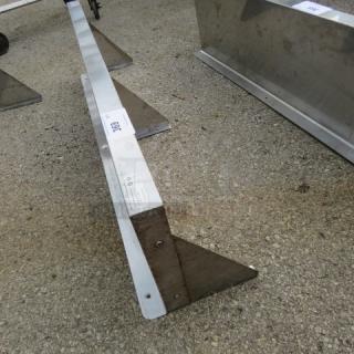 Stainless steel wall mount shelf, 48x12 inches, with 3 brackets. Features visible label detailing specifications. Good condition.