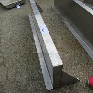 Stainless steel wall mount shelf with two brackets, 48x12 inches, in good condition with visible label detailing specifications.