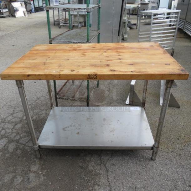 Boos Block butcher block table, 1-3/4" thick, 48x30x34 inches, split in the middle, with stainless steel under shelf.