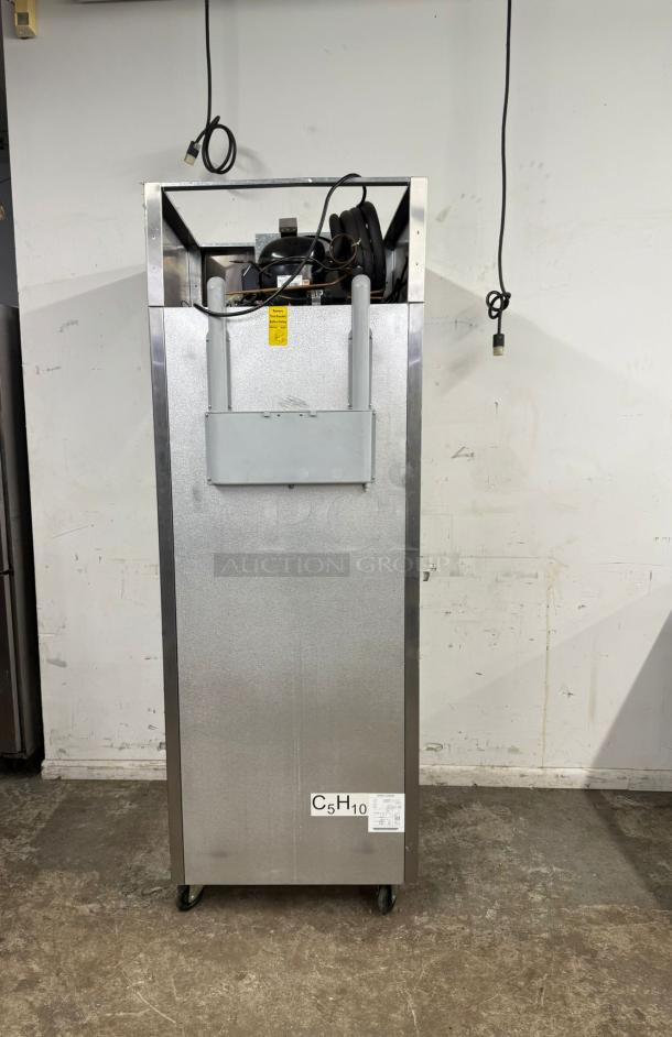 Atosa MBF8001 22.6 Cu.ft Reach-In Freezer, single door, top mount compressor, used condition, visible labels and wiring.