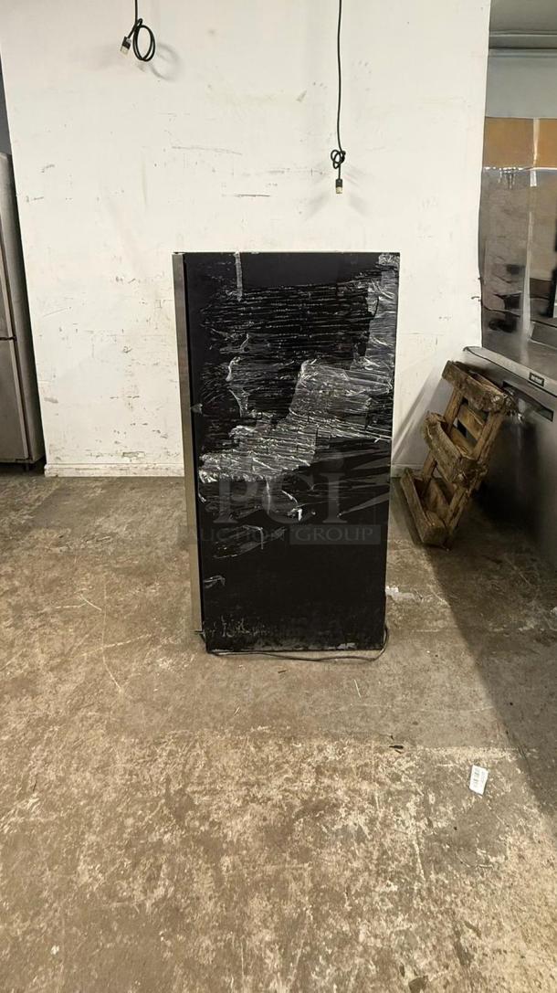 Summit SWCP2116 24" dual zone wine cellar in used condition, wrapped in protective plastic, with stainless steel trim and glass door.