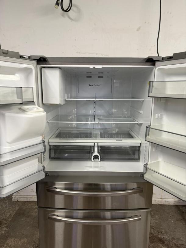Samsung 4-Door French Door Smart Refrigerator, stainless steel, open view with shelves, FlexZone drawer, and Twin Cooling system.