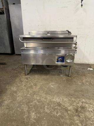 CLEVELAND 40 Gallon Tilt Skillet, stainless steel, commercial use, good condition, features manual tilt mechanism.