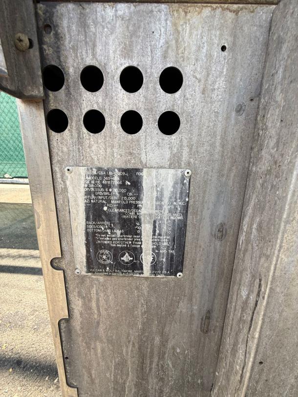 Delfield 18672BUCMP 72" undercounter refrigerator, metal exterior with visible vents and manufacturer's label. Fair condition.