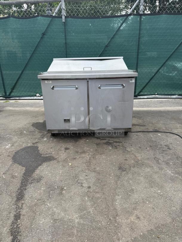 Kelvinator commercial prep table KCHMT48.18, 48" with refrigerated base, stainless steel, two-door, used condition.