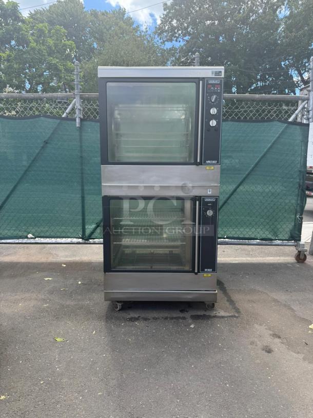 HOBART HRW 303 electric rotisserie oven and warmer, stainless steel, dual glass doors, visible control panel, used condition.