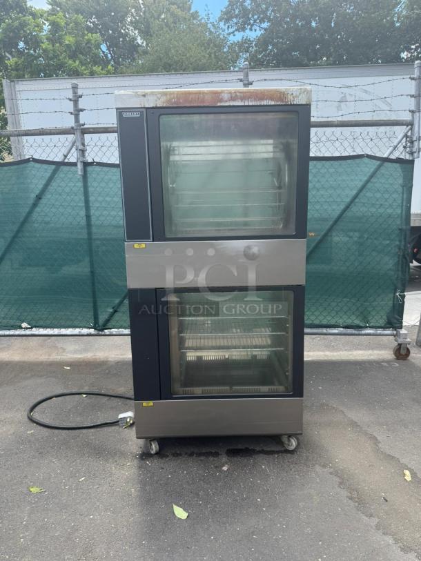HOBART HRW 303 electric rotisserie oven and warmer, stainless steel, glass doors, visible wear, portable on wheels.