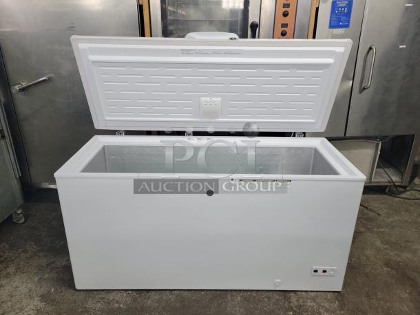 GE 65-inch chest freezer, model FCM16SLB, 15.7 cu. ft., Energy Star rated, tested and working, white finish.