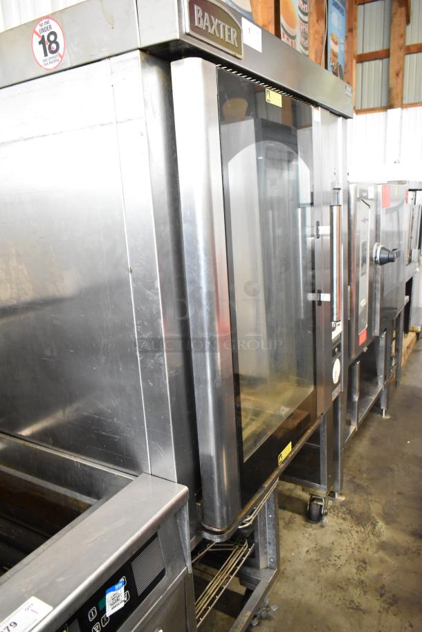 Baxter BV400G stainless steel mini rotating rack oven, natural gas, self-cleaning, on commercial casters, visible wear.