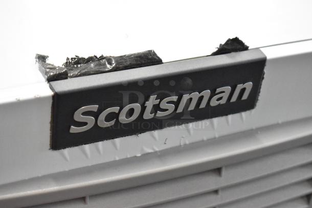 Scotsman MC1030MA-32A ice head; brand new with minor scratches; stainless steel; 208/230V, 1 phase; logo detail shown.