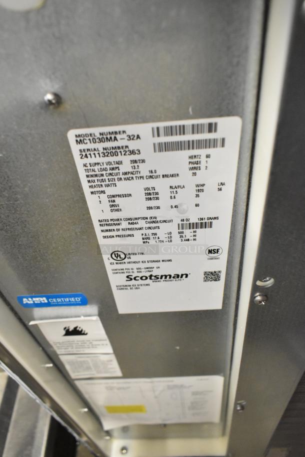 BRAND NEW SCRATCH AND DENT! 2024 Scotsman MC1030MA-32A Stainless Steel Commercial Ice Head; 208/230 Volts, 1 Phase, with visible model and serial number on label.