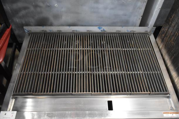 Brand new Vulcan VACB47-101 stainless steel countertop charbroiler, 136,000 BTU, natural gas, scratch and dent condition.