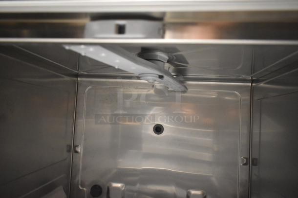 Brand new 2024 Noble 495HTUC24 stainless steel high temp undercounter dishwasher interior. 208/240V, 1 Phase.