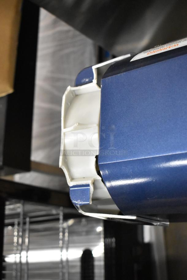 BRAND NEW Waring WSM20LT 20 Quart Metal Dough Mixer, blue housing. Scratch and dent model, shown close-up.