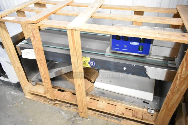 Brand new Prince Castle HPC-2A stainless steel heated bird cage, 56"x21", 120/240 volts, 1 phase, in wood crate.
