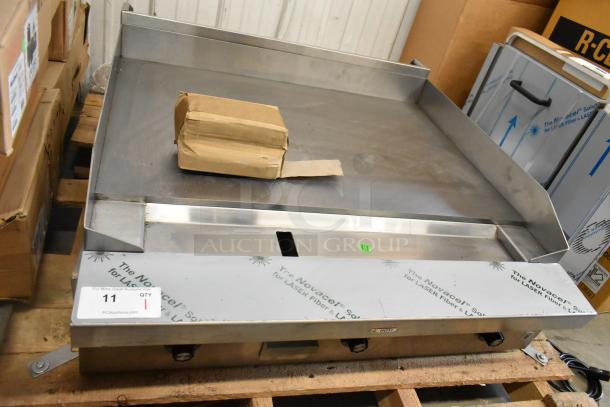 Brand new 2021 Southbend PE36N-TTT stainless steel electric flat top griddle, 208V, 1 phase, on pallet, protective film intact.