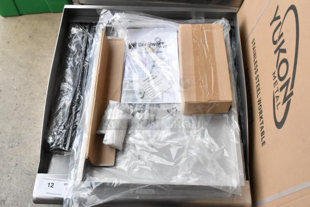 Brand new Cecilware Pro CCP24 stainless steel charbroiler grill in packaging. Includes manuals and accessories.