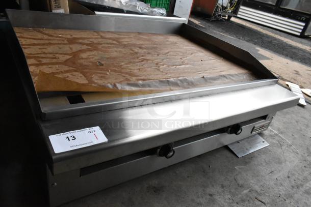 Brand new 2021 Therma-Tek TC36-36TGL stainless steel propane gas flat top griddle with protective covering.