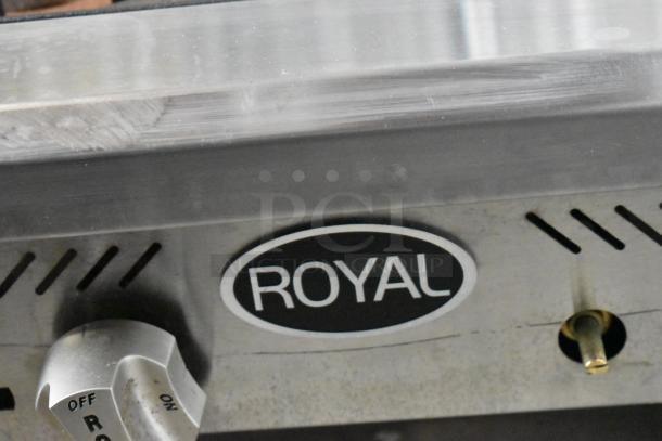 Royal stainless steel commercial 4-burner countertop gas range, features durable construction with visible brand label.