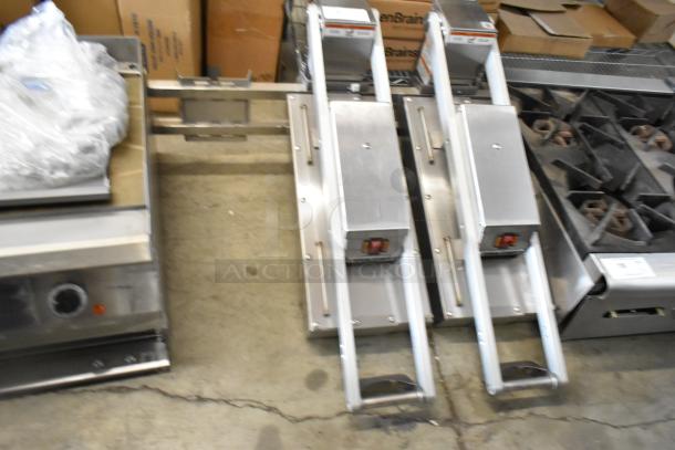 Vulcan VMCS-101BFIFM stainless steel 2-head clamshell hood for flat top griddle, shown in good condition.
