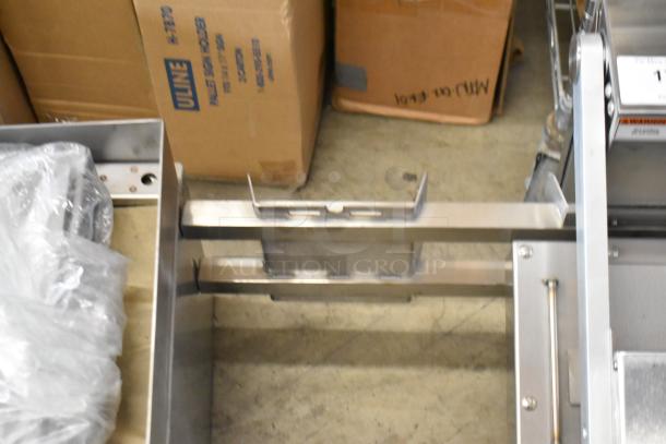Vulcan VMCS-101BFIFM stainless steel clamshell hood, 2 head, for flat top griddle. 208V, 1 phase, new condition.
