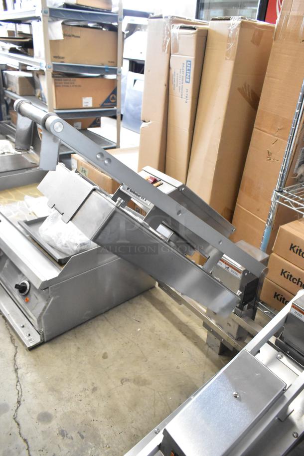 Vulcan VMCS-101BFIFM stainless steel clamshell hood for flat top griddle, 2 heads, 208V, 1 Phase, excellent condition.