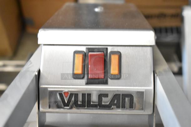 Vulcan VMCS-101BFIFM stainless steel clamshell hood, dual head, red and orange controls, 208V, 1 phase, for flat top griddle.