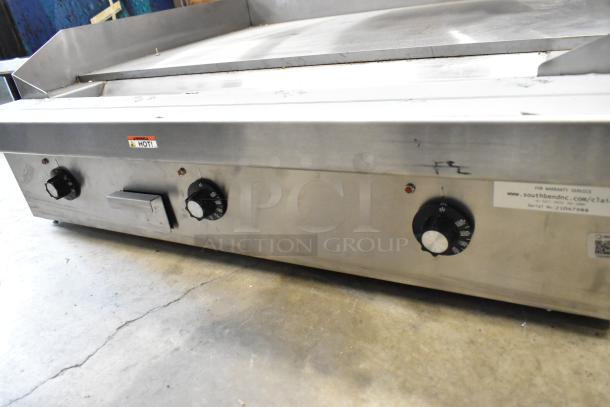 2021 Southbend PE36N-TTT stainless steel electric griddle, 208V, 1 Phase, heavy-duty, adjustable knobs, warranty label.