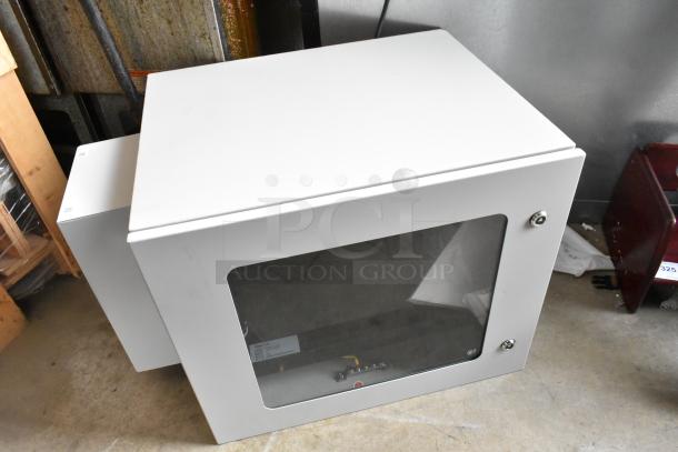 Telege TGZAUA6-A1L1AGN white metal cabinet with keys. Features a glass door that won't open. Solid construction.