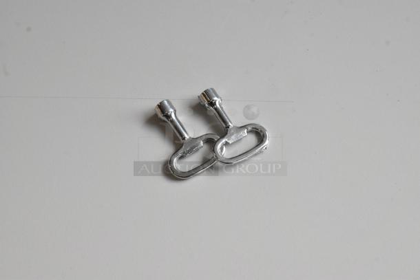 Chrome keys for Telege TGZAUA6-A1L1AGN cabinet; compatible but door won't open. Mint condition.