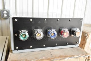 Power Assemblies gray metal box with multi-color connectors, black panel, and visible screws, in excellent condition.