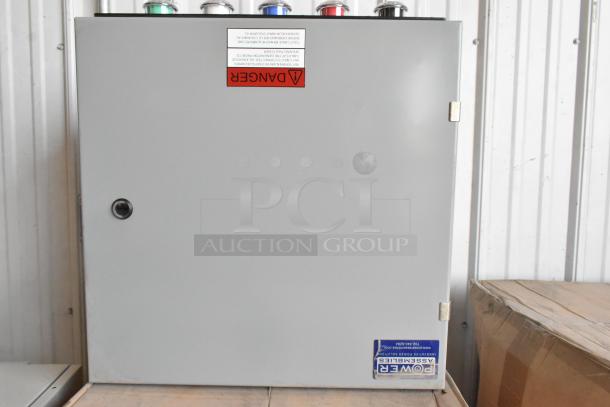 Power Assemblies gray metal box with danger label and company sticker, showing front view. Good condition, no visible damage.